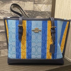 Coach mini bag NWT with detachable crossbody strap.